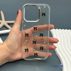 قاب موبایل IPHONE 16 PRO رزینی اکلیلی طلایی مدل پاپیون مشکی
